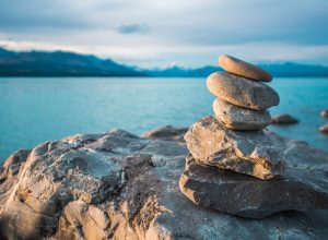 Zen stones on beach pukaki lake